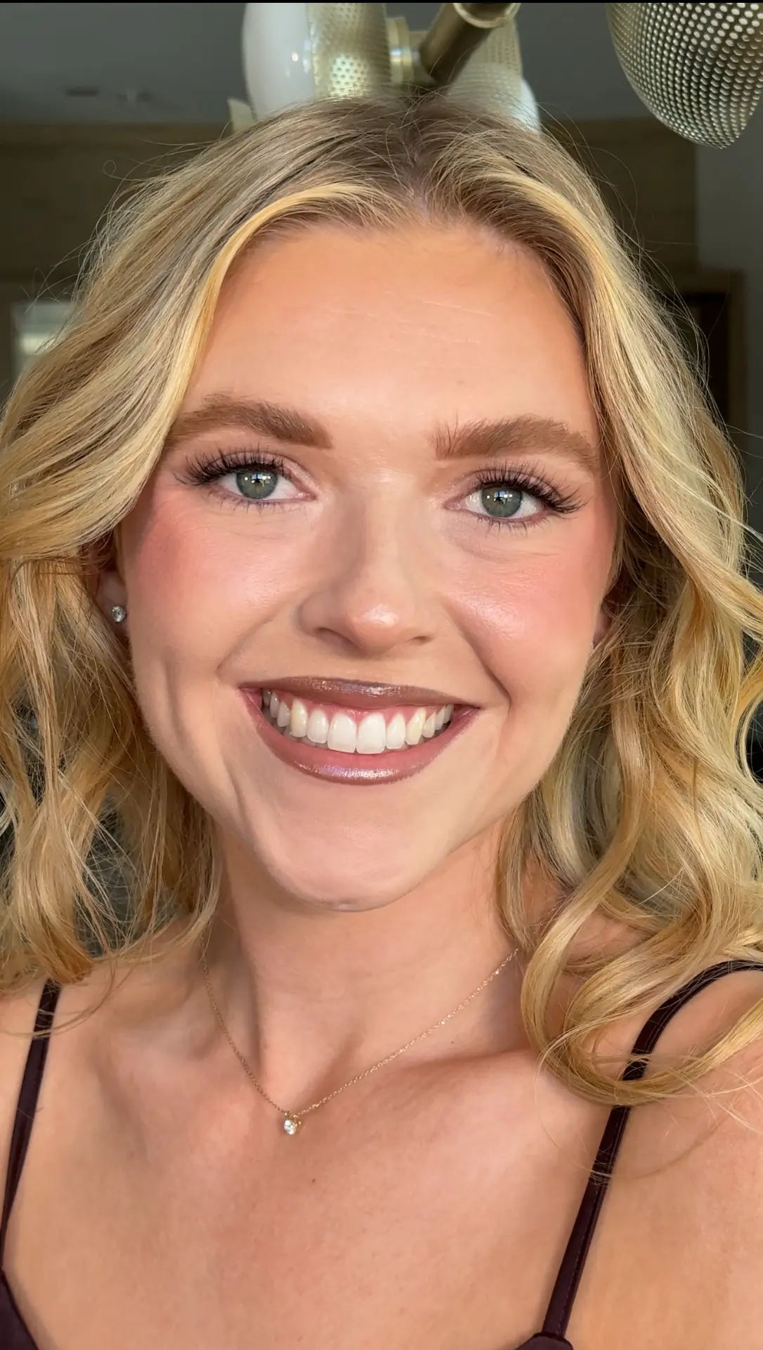 Fresh, glowing event makeup with a soft pink lip